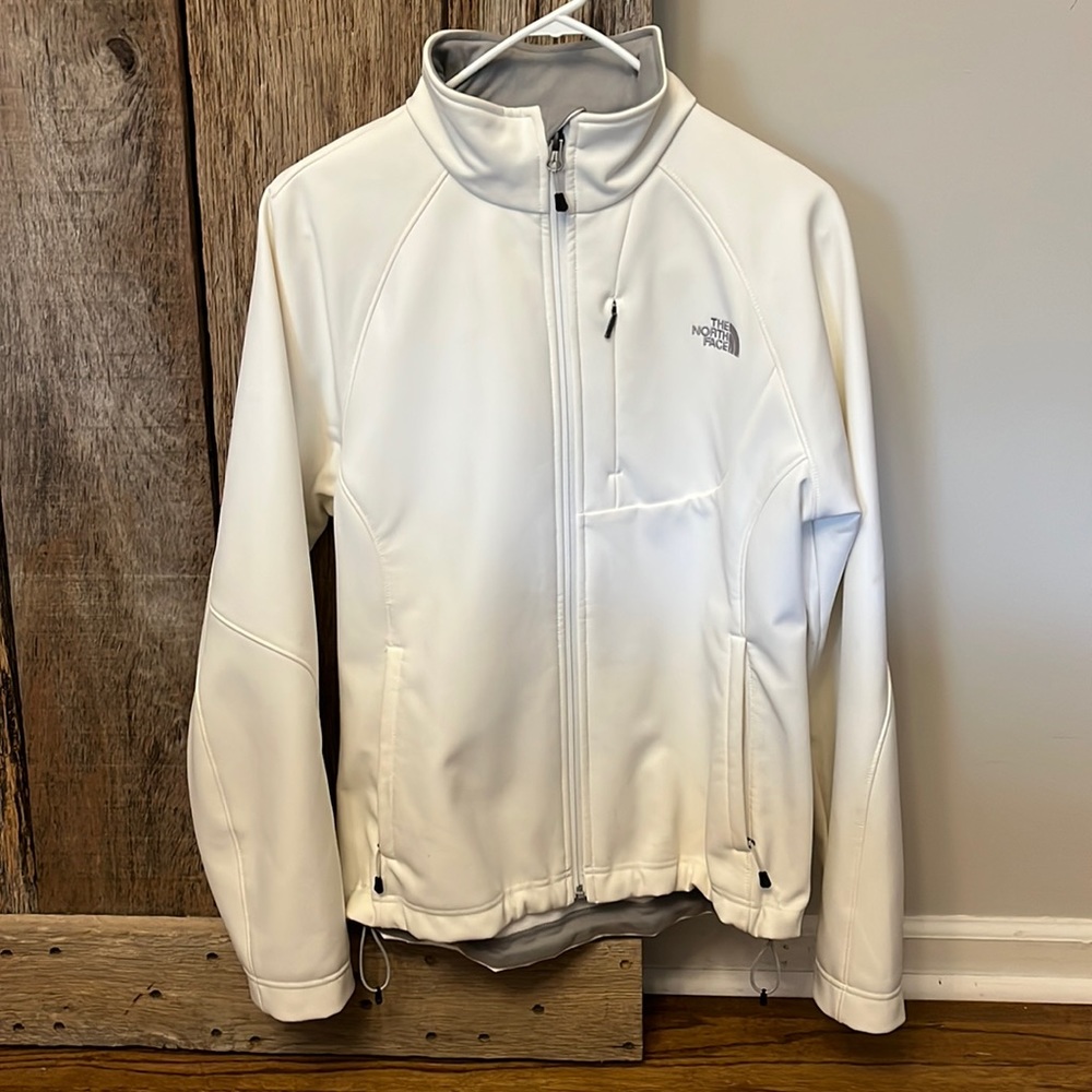 White North Face zip up jacket